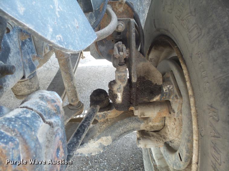 image for item DC7367 1999 GMC C7500 roll-off container truck