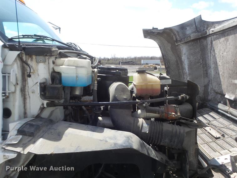 image for item DC7367 1999 GMC C7500 roll-off container truck