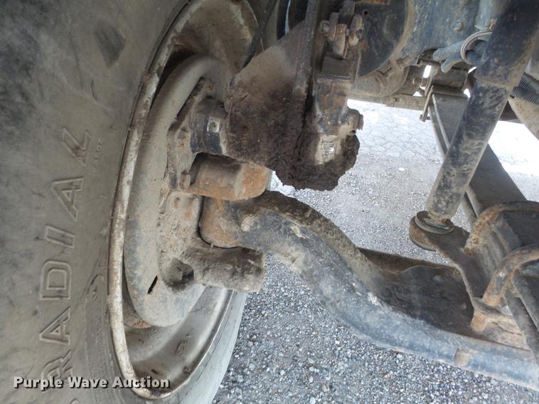 image for item DC7367 1999 GMC C7500 roll-off container truck