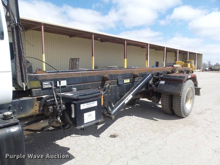 image for item DC7367 1999 GMC C7500 roll-off container truck