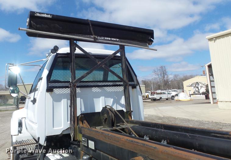 image for item DC7367 1999 GMC C7500 roll-off container truck