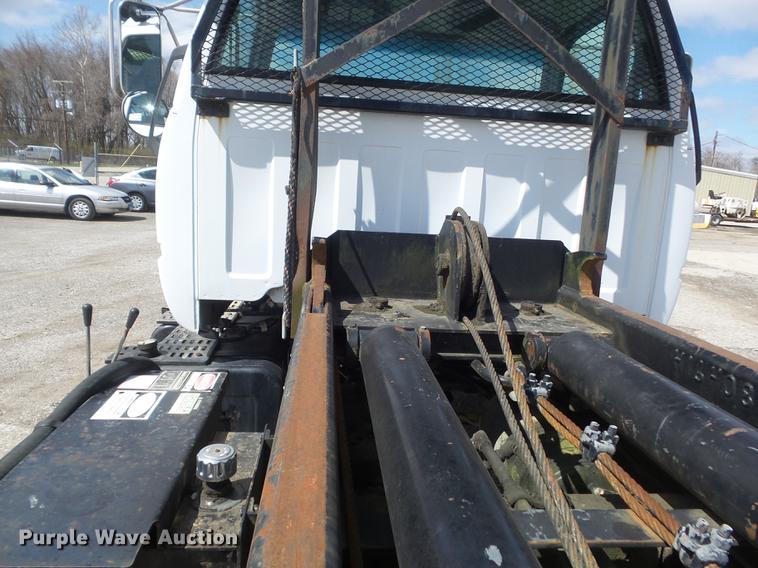 image for item DC7367 1999 GMC C7500 roll-off container truck