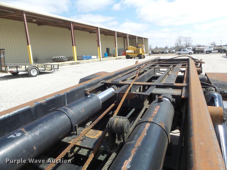 image for item DC7367 1999 GMC C7500 roll-off container truck