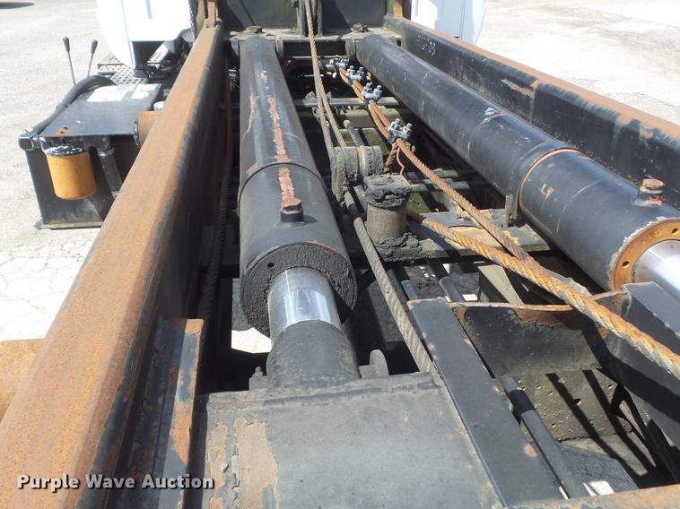 image for item DC7367 1999 GMC C7500 roll-off container truck