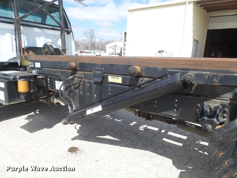 image for item DC7367 1999 GMC C7500 roll-off container truck