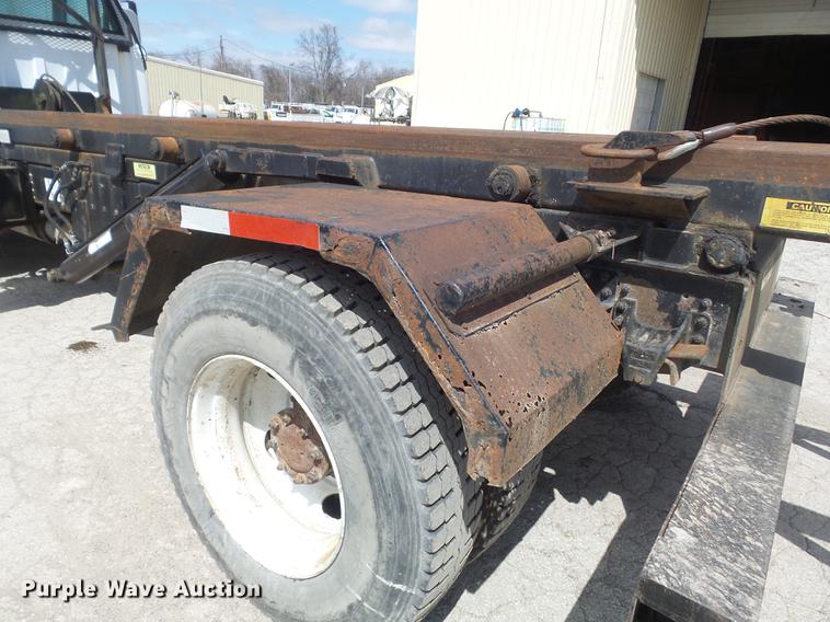 image for item DC7367 1999 GMC C7500 roll-off container truck