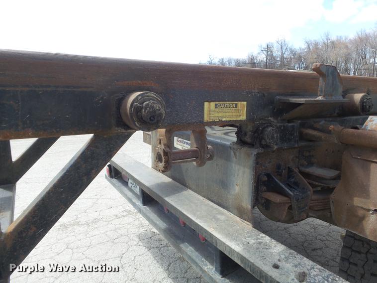 image for item DC7367 1999 GMC C7500 roll-off container truck