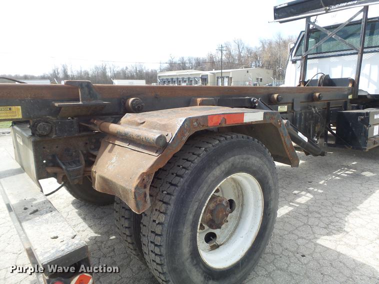 image for item DC7367 1999 GMC C7500 roll-off container truck
