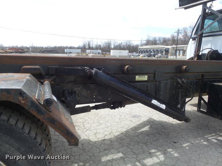 image for item DC7367 1999 GMC C7500 roll-off container truck