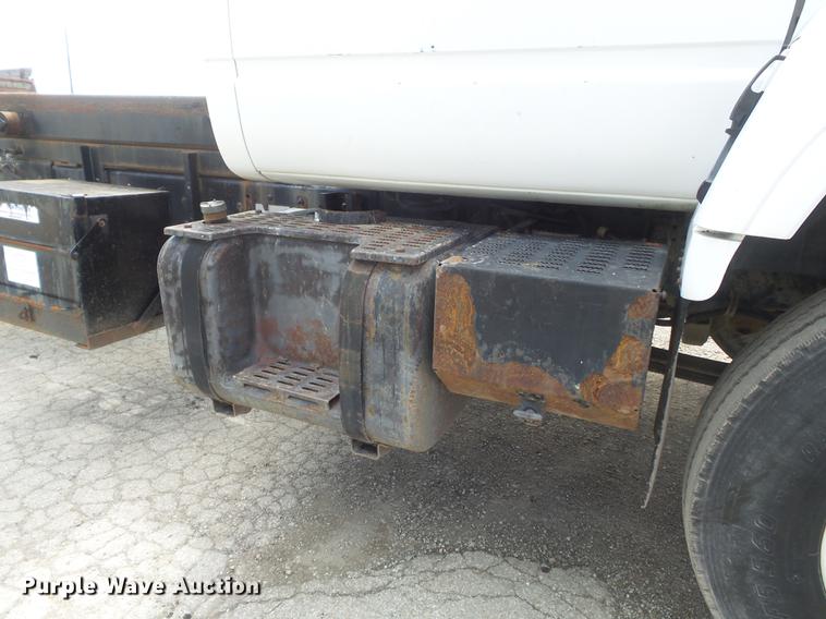 image for item DC7367 1999 GMC C7500 roll-off container truck