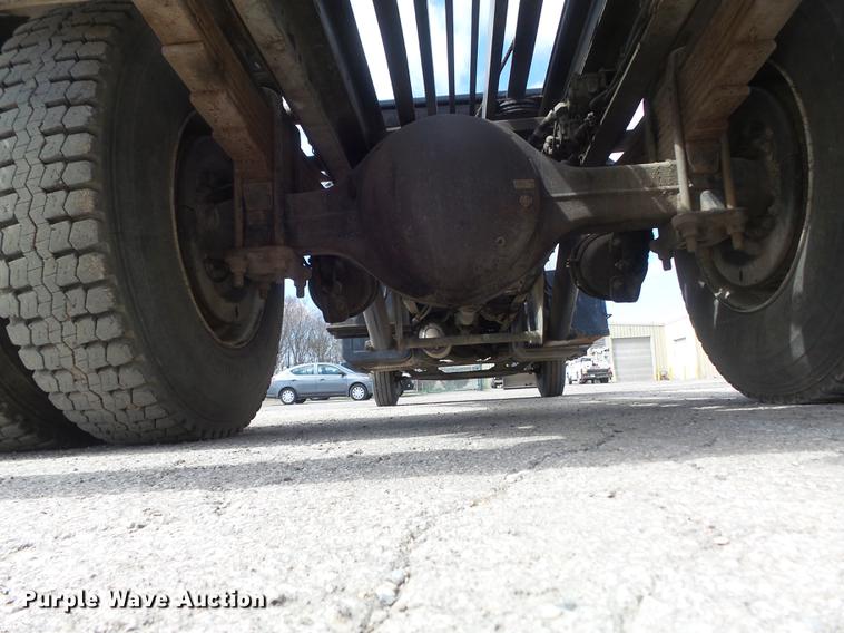 image for item DC7367 1999 GMC C7500 roll-off container truck