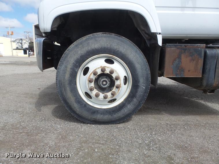 image for item DC7367 1999 GMC C7500 roll-off container truck