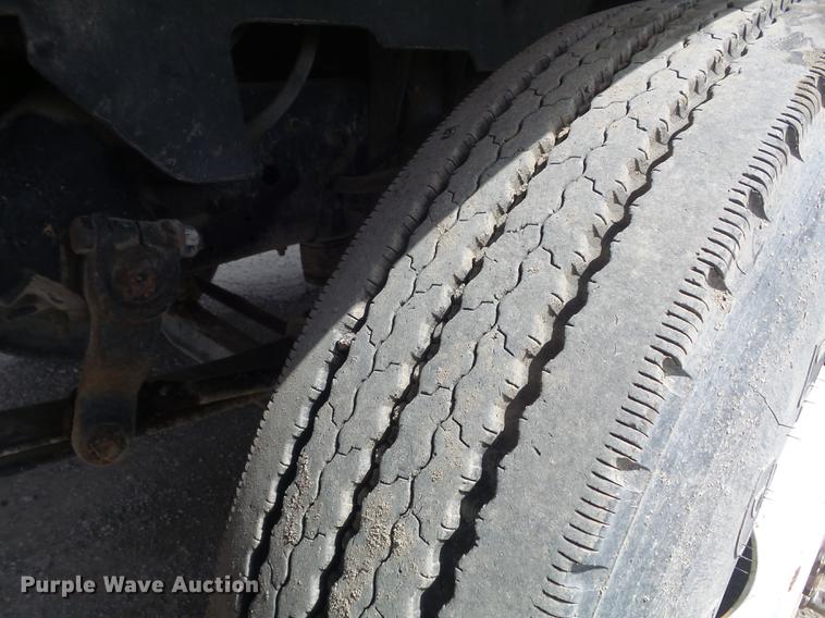 image for item DC7367 1999 GMC C7500 roll-off container truck