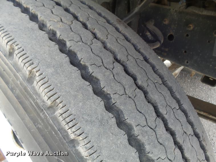 image for item DC7367 1999 GMC C7500 roll-off container truck