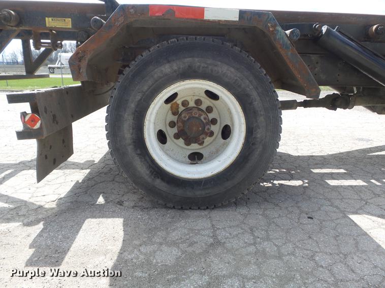 image for item DC7367 1999 GMC C7500 roll-off container truck