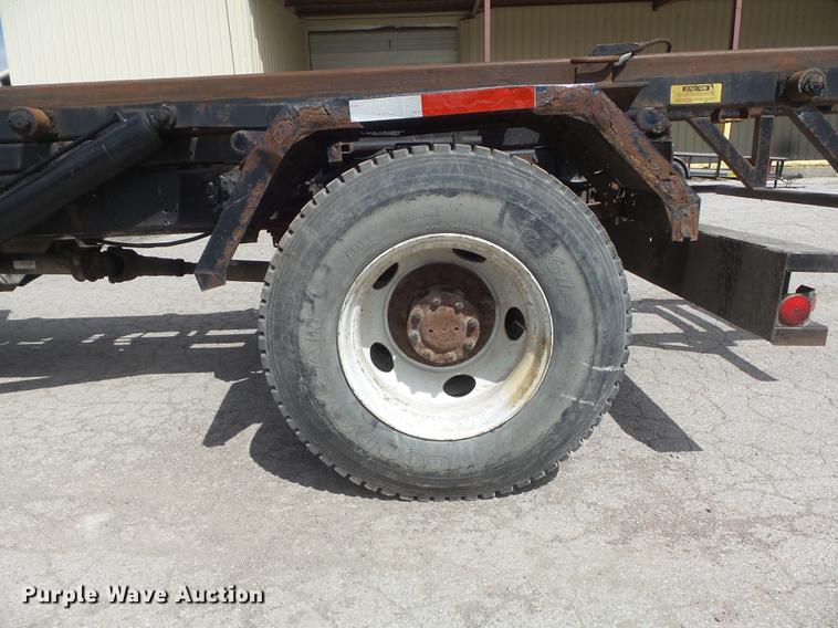 image for item DC7367 1999 GMC C7500 roll-off container truck