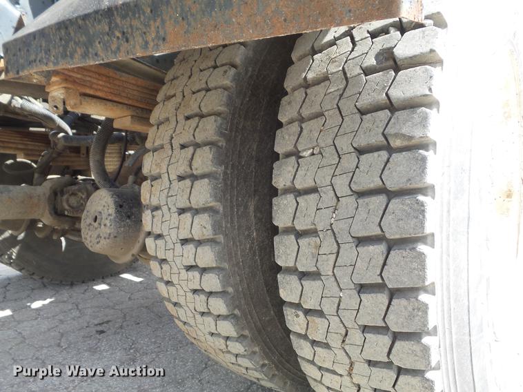 image for item DC7367 1999 GMC C7500 roll-off container truck