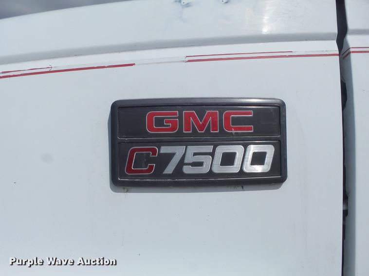 image for item DC7367 1999 GMC C7500 roll-off container truck