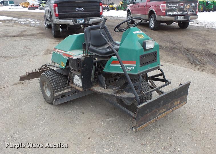 image for item DW9649 1999 Cushman Groom Master bunker rake