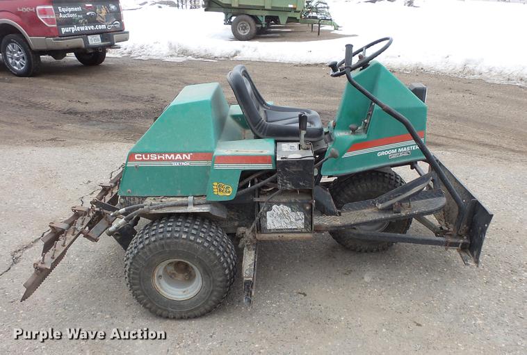 image for item DW9649 1999 Cushman Groom Master bunker rake