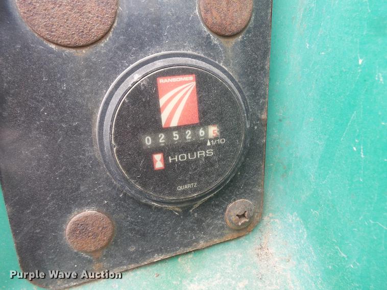 image for item DW9649 1999 Cushman Groom Master bunker rake