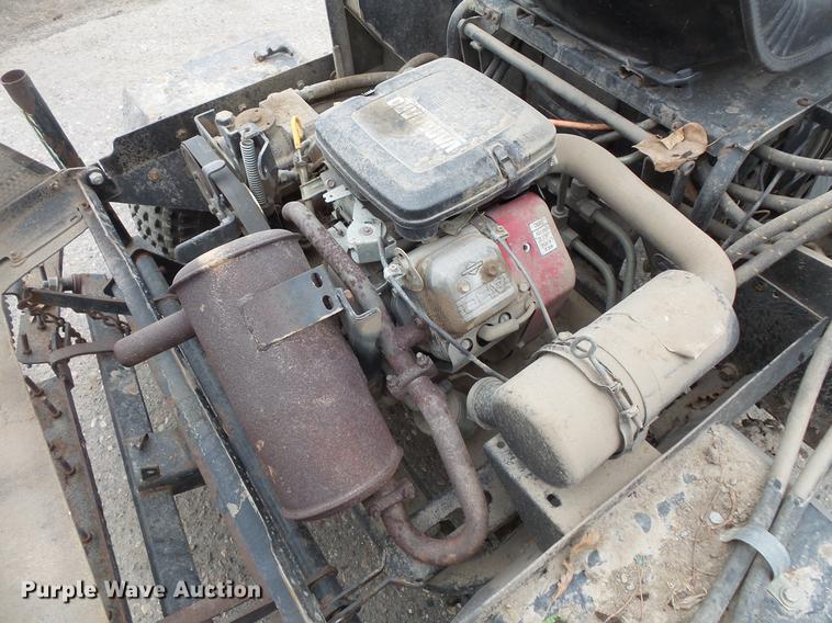 image for item DW9649 1999 Cushman Groom Master bunker rake