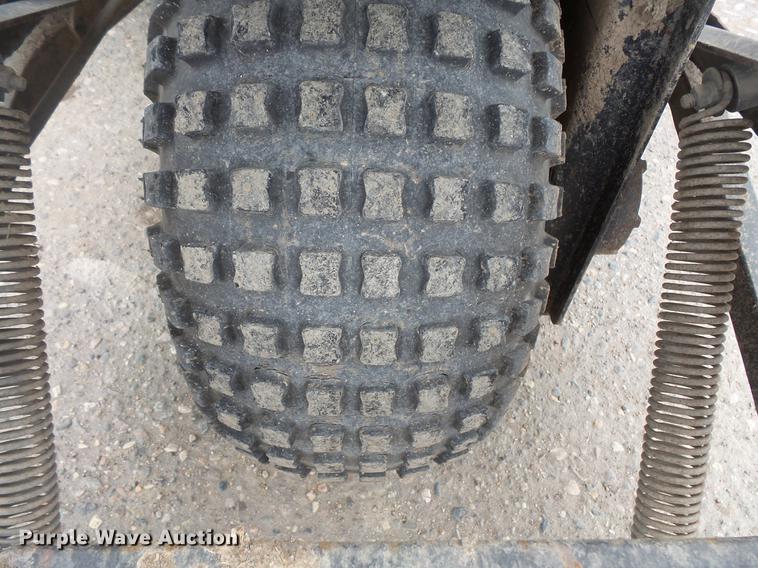 image for item DW9649 1999 Cushman Groom Master bunker rake