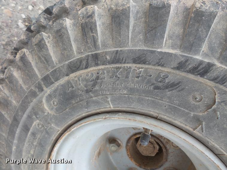 image for item DW9649 1999 Cushman Groom Master bunker rake