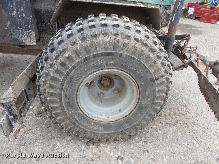 image for item DW9649 1999 Cushman Groom Master bunker rake