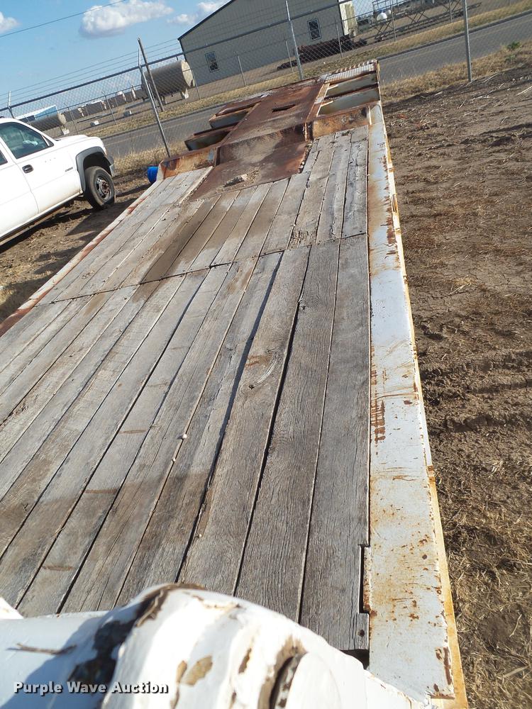 image for item EN9546 1973 lowboy equipment trailer