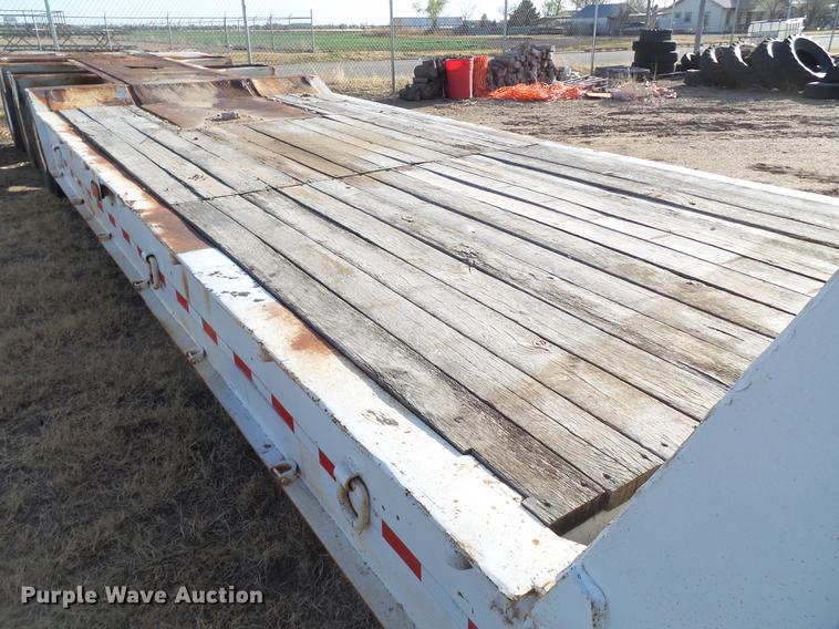 image for item EN9546 1973 lowboy equipment trailer