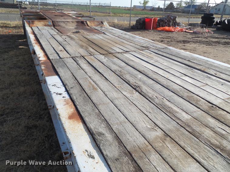 image for item EN9546 1973 lowboy equipment trailer