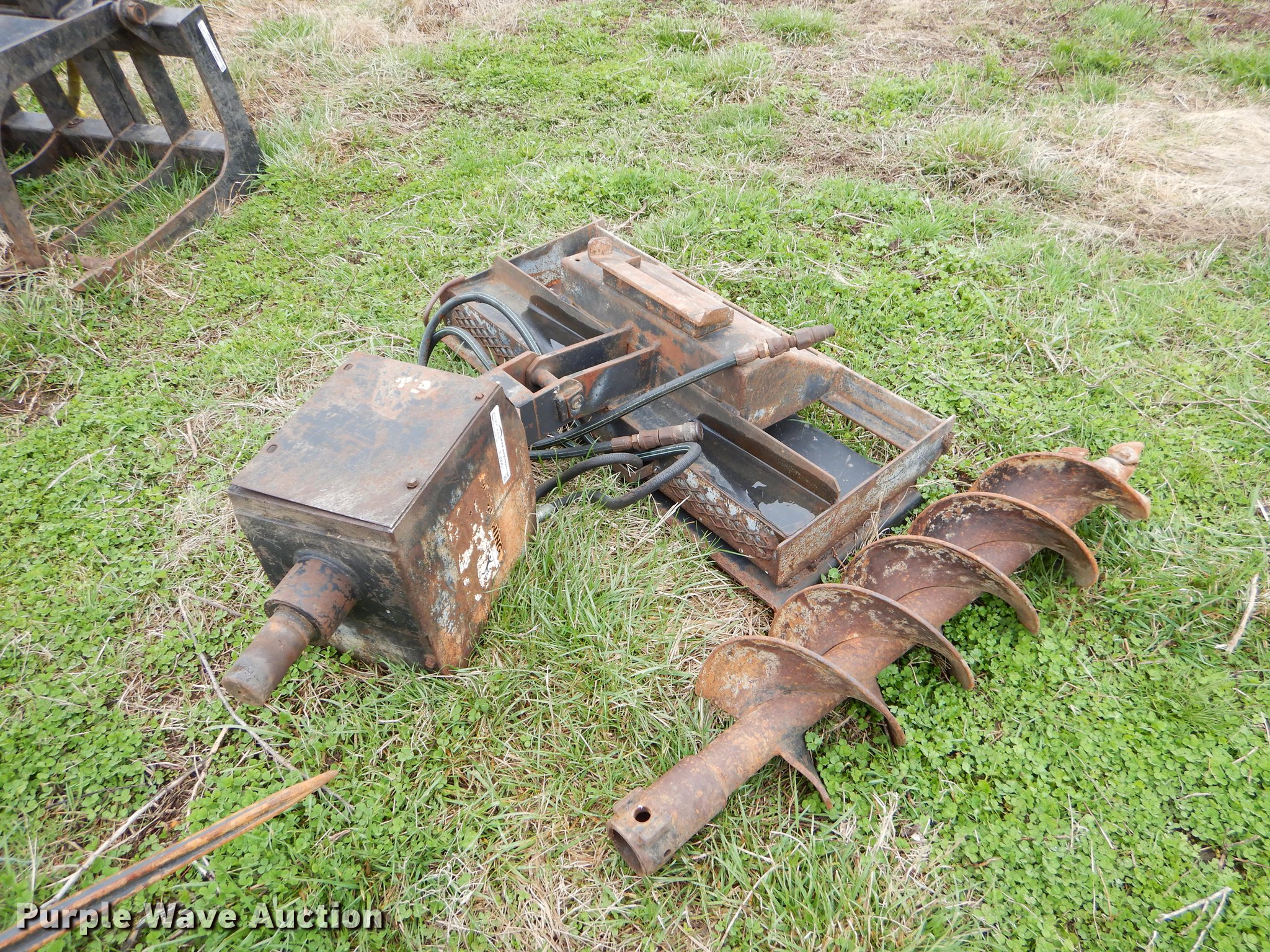 Skid steer auger in Parsons, KS Item EJ9961 sold Purple Wave