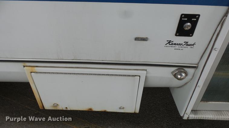 image for item DC3235 2009 Ford E450 Super Duty shuttle bus