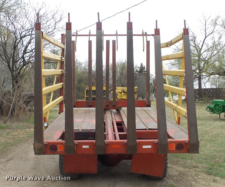 image for item DC3112 New Holland 1079 bale stacker