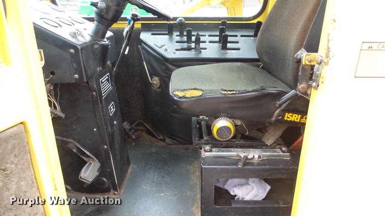 image for item DC3112 New Holland 1079 bale stacker