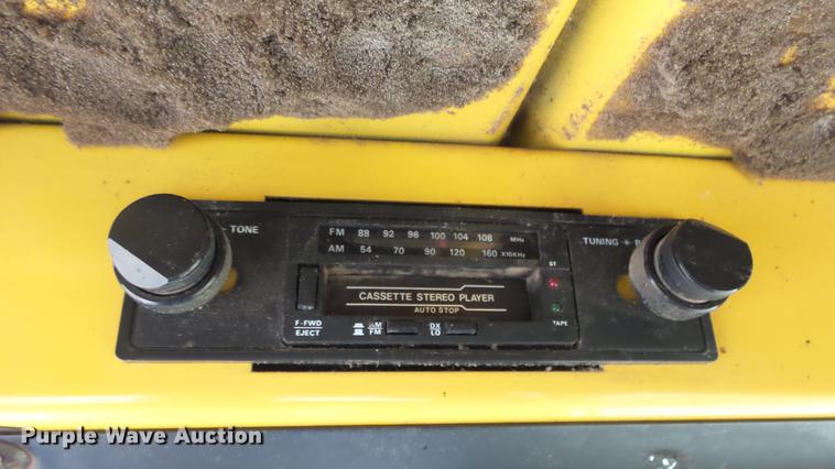 image for item DC3112 New Holland 1079 bale stacker