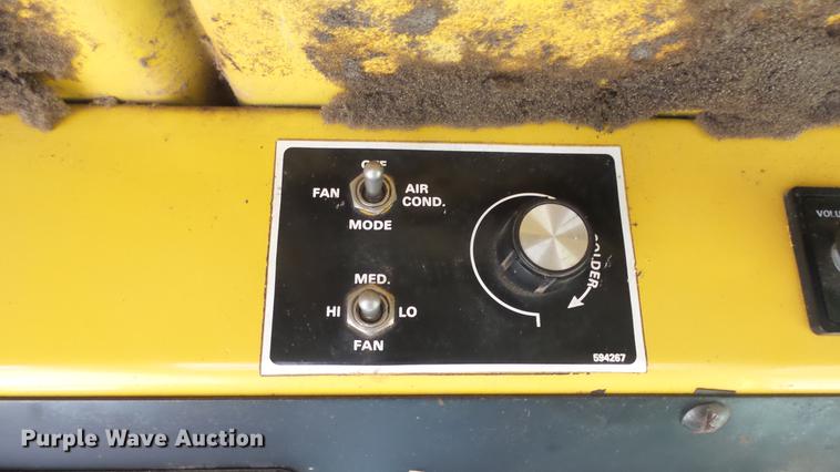 image for item DC3112 New Holland 1079 bale stacker