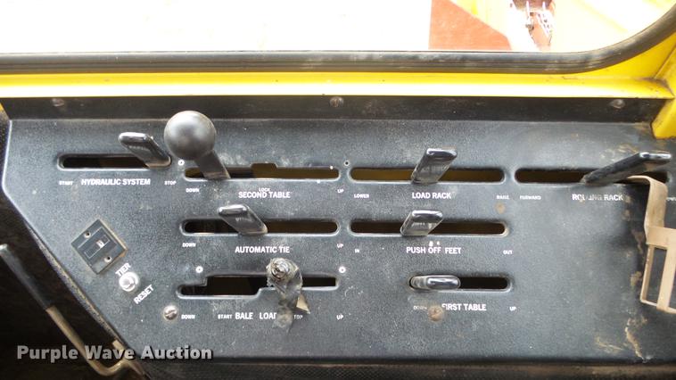 image for item DC3112 New Holland 1079 bale stacker