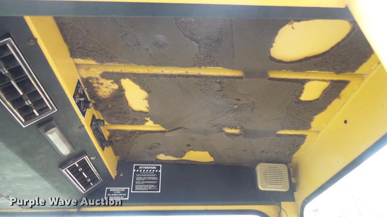 image for item DC3112 New Holland 1079 bale stacker