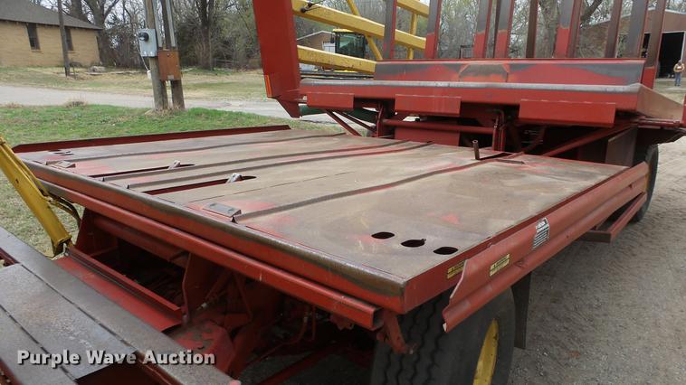 image for item DC3112 New Holland 1079 bale stacker