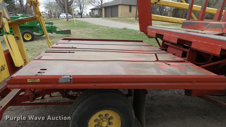 image for item DC3112 New Holland 1079 bale stacker