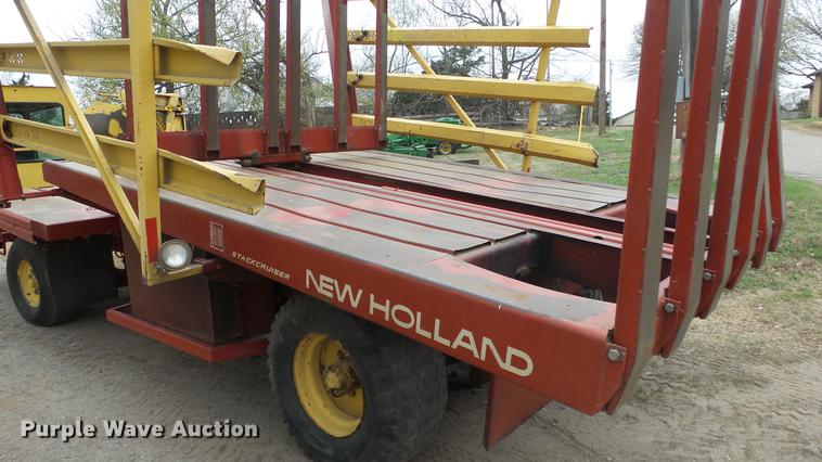 image for item DC3112 New Holland 1079 bale stacker