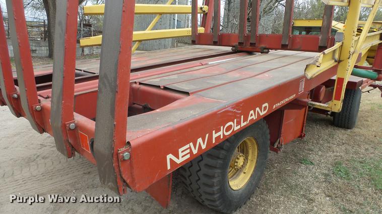 image for item DC3112 New Holland 1079 bale stacker