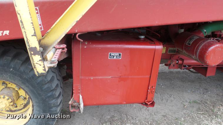 image for item DC3112 New Holland 1079 bale stacker