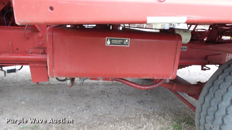 image for item DC3112 New Holland 1079 bale stacker