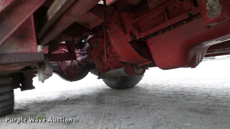 image for item DC3112 New Holland 1079 bale stacker