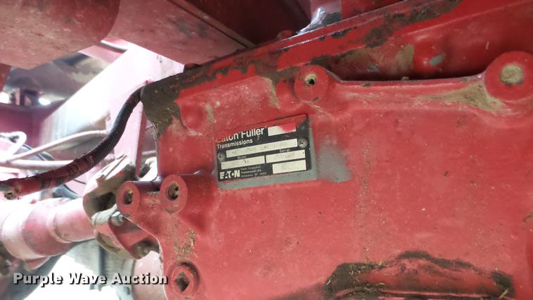 image for item DC3112 New Holland 1079 bale stacker