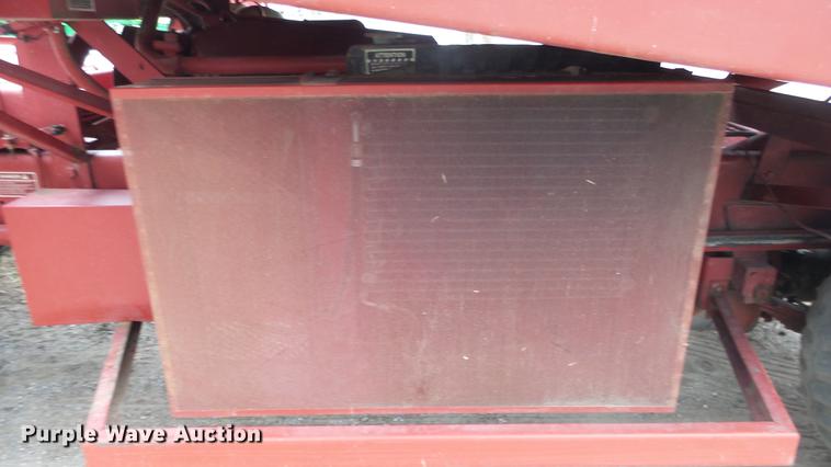 image for item DC3112 New Holland 1079 bale stacker