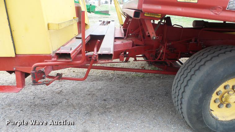 image for item DC3112 New Holland 1079 bale stacker